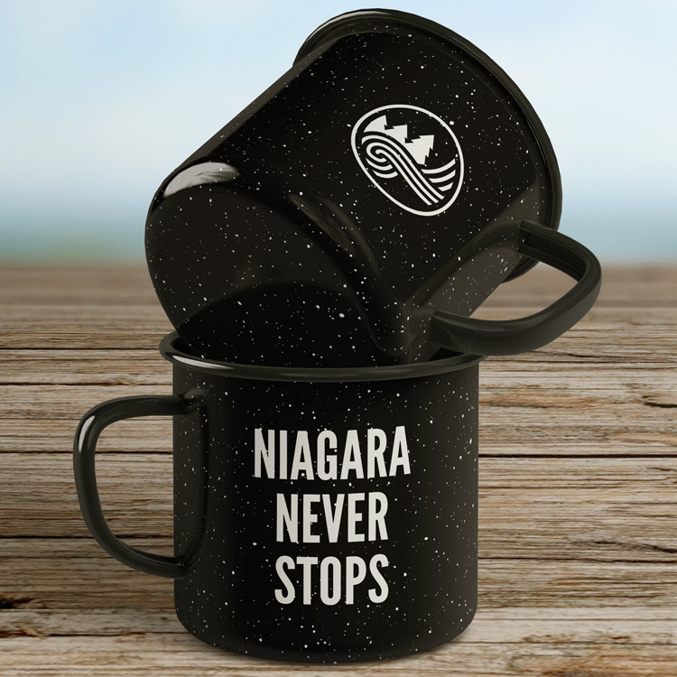Mugs with Niagara Never Stops printed on front